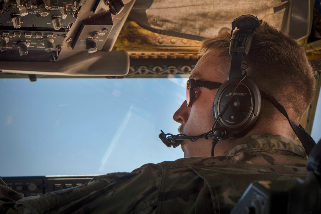 An Air Force pilot speaks with an air traffic control tower during a flight in support of Operation Inherent Resolve May 9, 2017. Air Force photo by Staff Sgt. Michael Battles