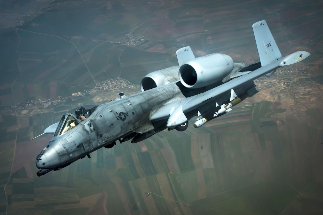 An Air Force A-10 Thunderbolt II departs after being refueled by a KC-135 Stratotanker during a mission in support of Operation Inherent Resolve, May 9, 2017. Air Force photo by Staff Sgt. Michael Battles