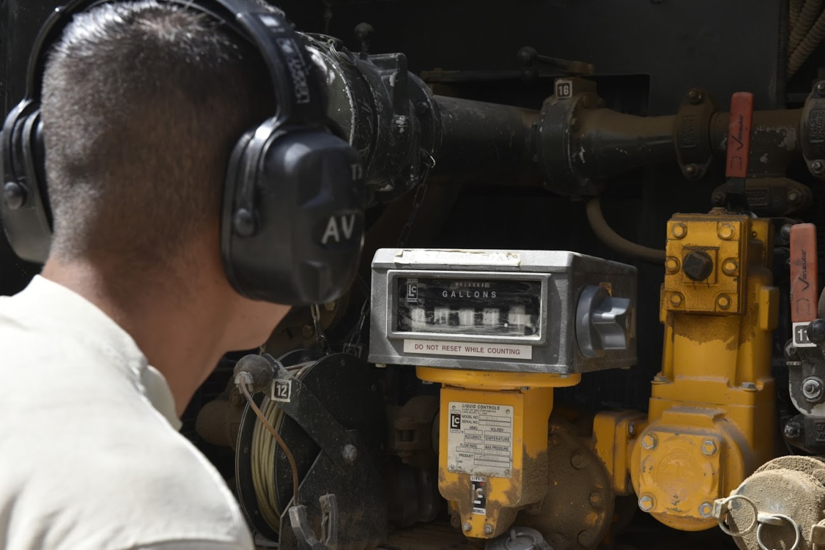 Senior Airman Adrian Alegria-Vasquez, 407th Expeditionary Logistic Readiness Squadron petroleum, oil and lubricants flight fuel distribution operator, documents the gallons of diesel delivered to a customer May 10, 2017, in Southwest Asia. Fuel technicians maintain all POL substances, from diesel and gasoline to jet fuel and liquid oxygen. These materials play a vital role in delivering airpower to the fight against ISIS. The team at the 407th Air Expeditionary Group supplies fuel to the U.S. Marine Corps, Italian and Polish air forces. (U.S. Air Force photo by Senior Airman Ramon A. Adelan)