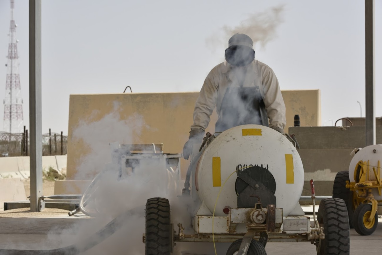 U.S. Marine Corps Lance Cpl. Patrick Cook, Marine Aerial Refueler Transport Squadron VMGR-352 safety and survival aircraft mechanic, monitors the intake of liquid oxygen into a portable tank May 10, 2017, in Southwest Asia. Fuel technicians maintain all POL substances, from diesel and gasoline to jet fuel and liquid oxygen. Liquid oxygen allows fighter pilots to breathe safely at high altitude during the fight against ISIS. The team here at the 407th Air Expeditionary Group supplies U.S. Marine Corps and coalition aircraft. (U.S. Air Force photo by Senior Airman Ramon A. Adelan)