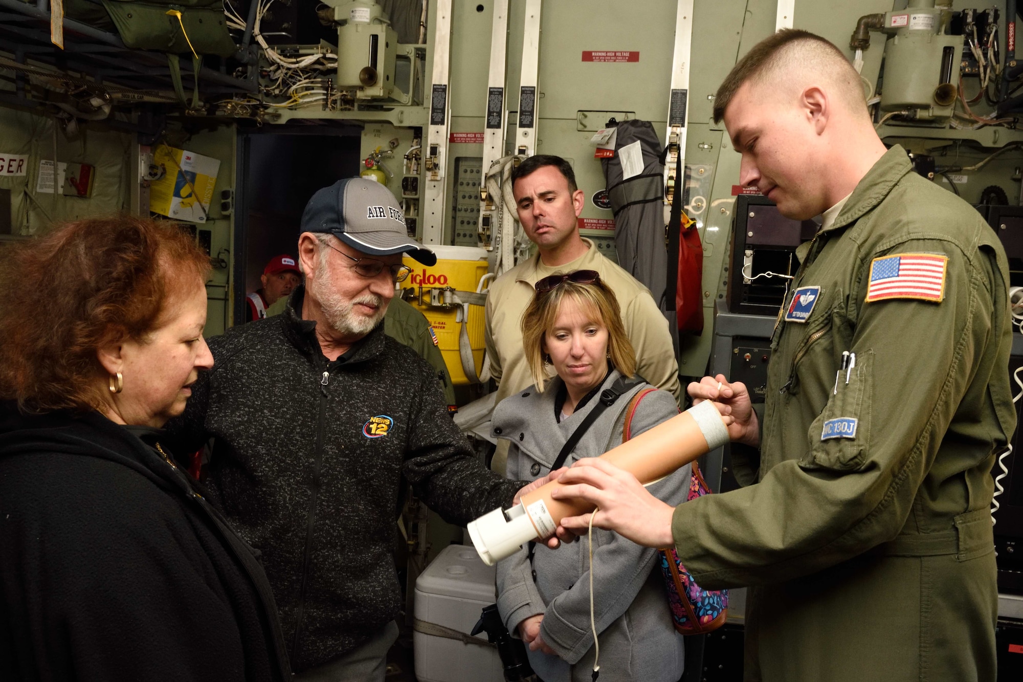 Tech. Sgt. Thomas Barnaby, 53rd Weather Reconnaissance Squadron weather reconnaissance loadmaster, talks to members of the media and public about the weather-data-gathering instrument called the dropsonde in Islip, New York, during the 2017 Hurricane Awareness Tour May 8, 2017. The purpose of the tour, which ran from May 6-12, 2017, was to focus attention on the approaching hurricane season and on protecting communities through preparedness and awareness. (U.S. Air Force photo/Tech. Sgt. Ryan Labadens)