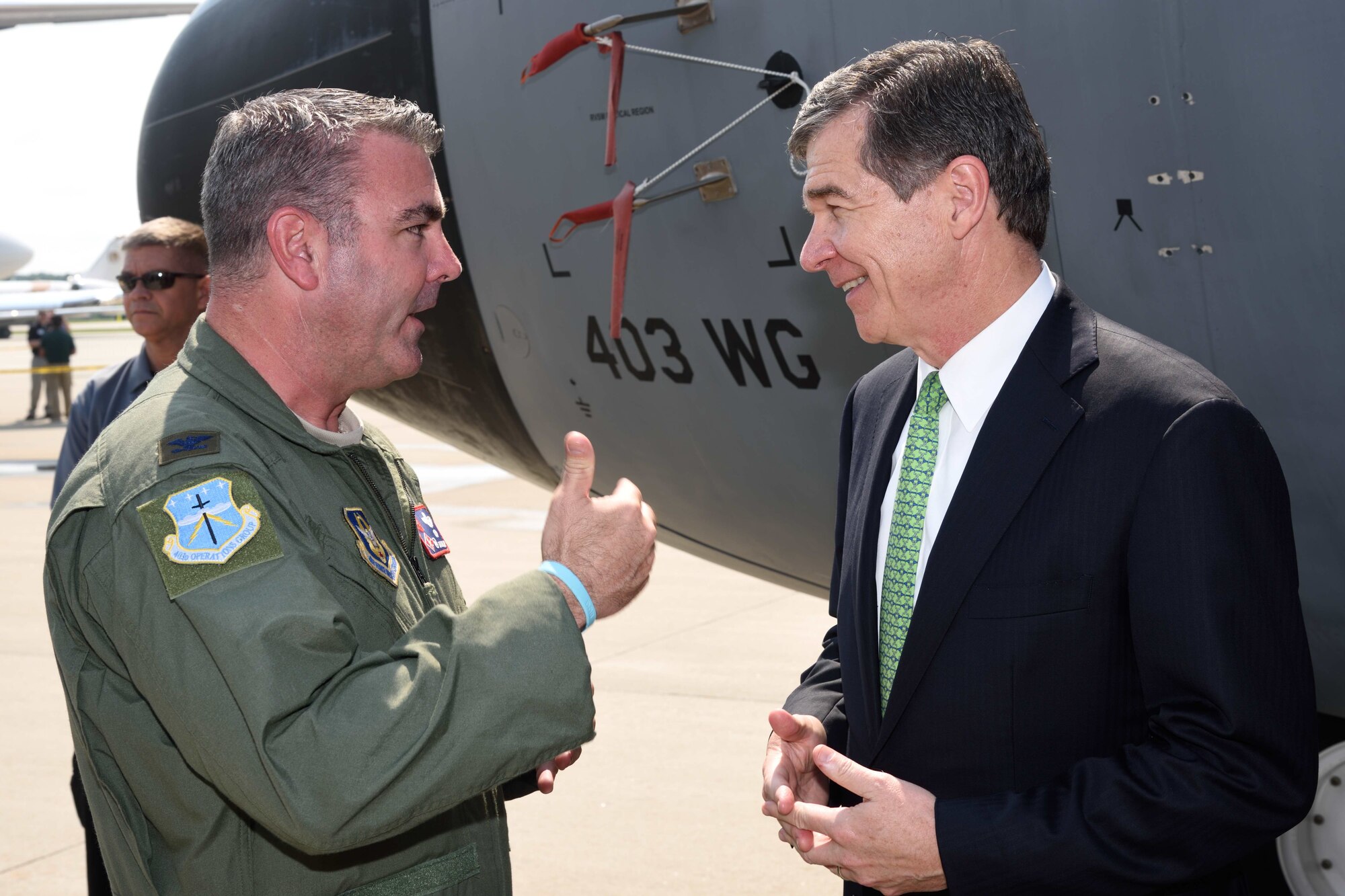 Col. Brian May, 403rd Wing Operations Group commander, talks with North Carolina Governor Roy Cooper about the mission of the 53rd Weather Reconnaissance Squadron “Hurricane Hunters” in Raleigh, North Carolina, during the 2017 Hurricane Awareness Tour May 10, 2017. The purpose of the tour, which ran from May 6-12, 2017, was to focus attention on the approaching hurricane season and on protecting communities through preparedness and awareness. (U.S. Air Force photo/Tech. Sgt. Ryan Labadens)