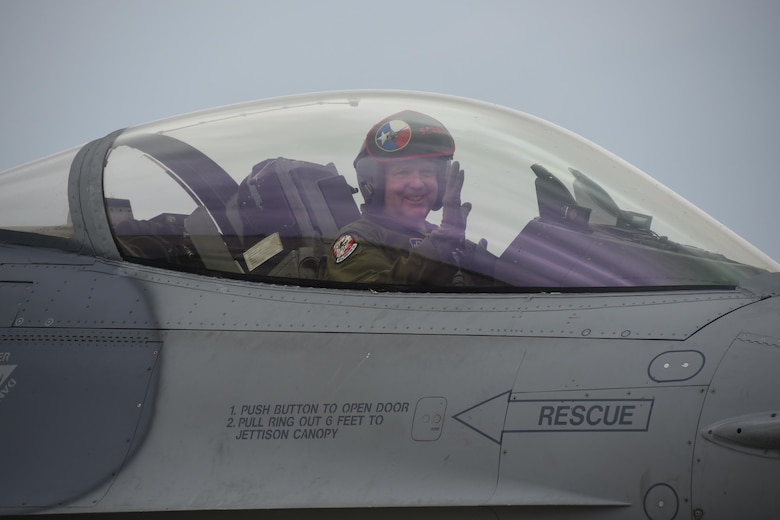 Maj. Gen. Richard Scobee, Tenth Air Force commander, waves to family, friends and Airmen as he returns from his final flight at Naval Air Station Fort Worth Joint Reserve Base, Texas, May 10, 2017. After his change of command next week, Scobee will become the vice commander, Air Force Reserve Command, Robins Air Force Base, Ga. (U.S. Air Force photo by Ms. Julie Briden-Garcia)
