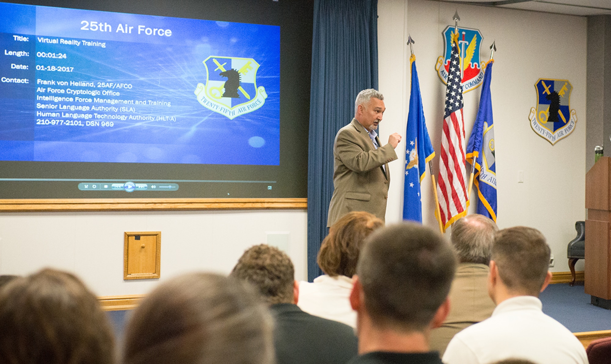 Frank “Chip” von Heiland, Air Force Cryptologic Office, 25th Air Force, discusses virtual reality training options with the Department of Defense’s 2017 Executive Leadership Development Program participants May 9. (U.S. Air Force Photo by Sharon Singleton)