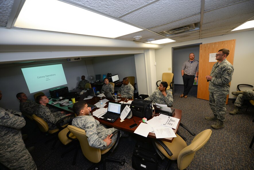 MSgt. James Arent, 55th Security Forces Squadron NCOIC of training, conducts convoy contingency training for Airmen assigned to the 55th Contracting Squadron at Offutt Air Force Base, Neb., May 10, 2017. Arent ran through a series of scenarios giving Airmen a look into what to expect during convoy operations. (U.S. Air Force photo by Zachary Hada)