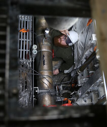 Joseph Blair, the USNS Trenton’s third engineer, replaces cables during an annual dry dock overhaul period in Marseilles, France, April 7, 2017. The Trenton is one of only eight expeditionary fast transport ships in the Military Sealift Command’s inventory. Military Sealift Command-Europe photo by Matthew Montgomery