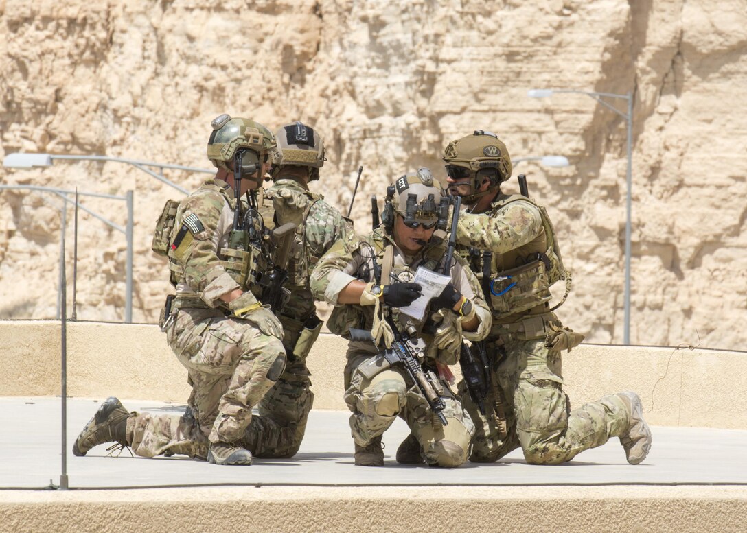 AMMAN, Jordan (May 11, 2017) Members of the Air Force Special Operations and Italian Special Operations secure a rooftop during an exercise in support of Eager Lion 2017. Eager Lion is an annual U.S. Central Command exercise in Jordan designed to strengthen military-to-military relationships between the U.S., Jordan and other international partners. This year's iteration is comprised of about 7,200 military personnel from more than 20 nations that will respond to scenarios involving border security, command and control, cyber defense and battlespace management. (U.S. Navy photo by Mass Communication Specialist 2nd Class Christopher Lange/Released)