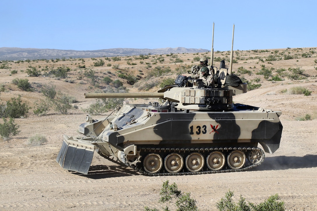 A tank maneuvers to a defensive position during the Blackhorse Regiment’s defense of the Whale Gap during an exercise at Fort Irwin, Calif., May 7, 2017. Army photo by Pfc. Austin Anyzeski