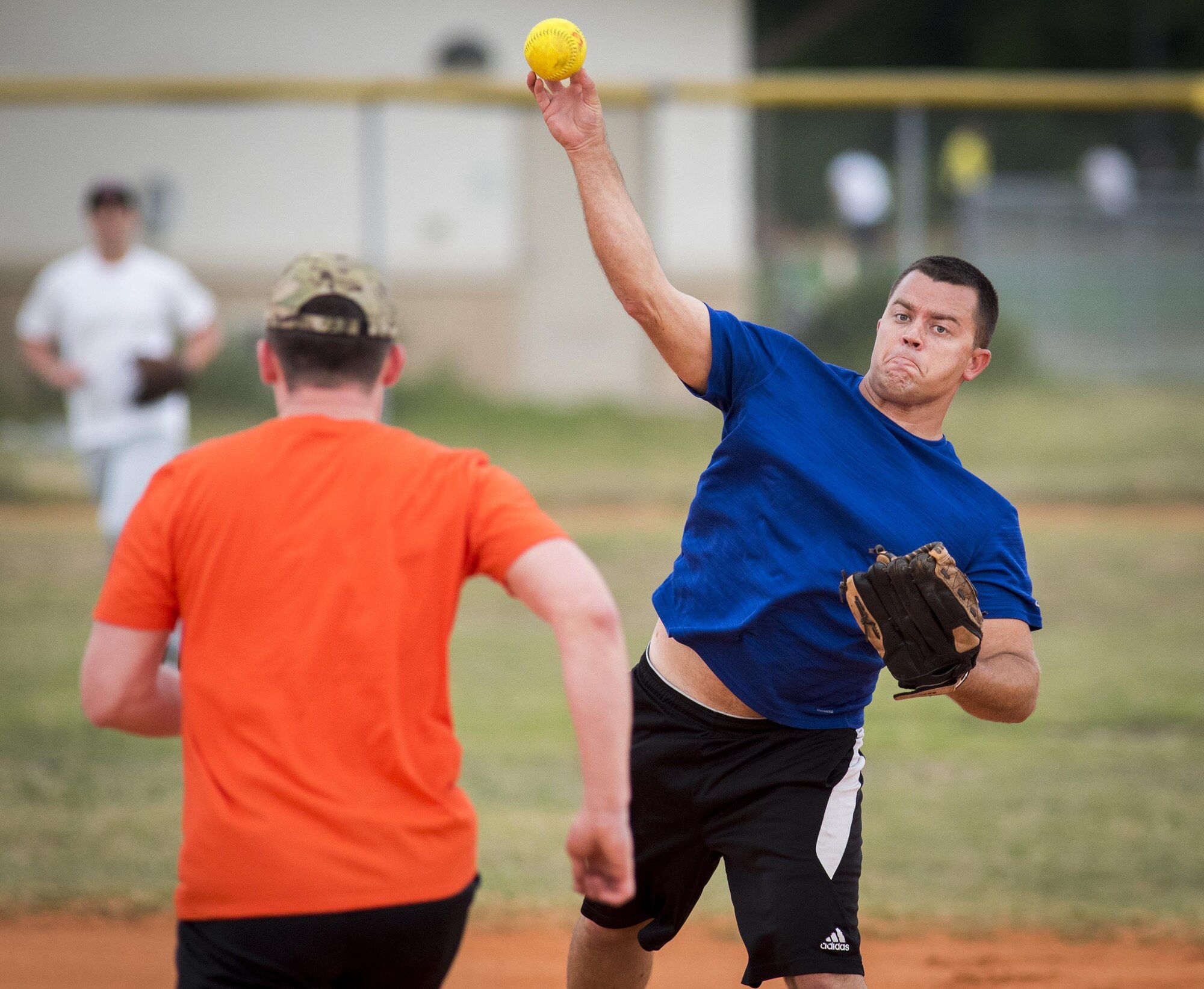 33rd Maintenance Group team second baseman, Jeffrey Beazey, tries for a double-play during their team’s intramural softball game against the 96th Communications Squadron team at Eglin Air Force Base, Fla., May 11.  The CS team won easily over the MXG team during the opening week of the intramural softball season.  (U.S. Air Force photo/Samuel King Jr.)