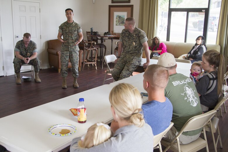 Maj. David Tran, Military Family Housing Division, G-4 Installations and Logistics, speaks with Combat Center residents during a safety forum at the Adobe District Clubhouse aboard Marine Corps Air Ground Combat Center, Twentynine Palms, Calif., May 9, 2017. (U.S. Marine Corps photo by Sgt. Connor Hancock)