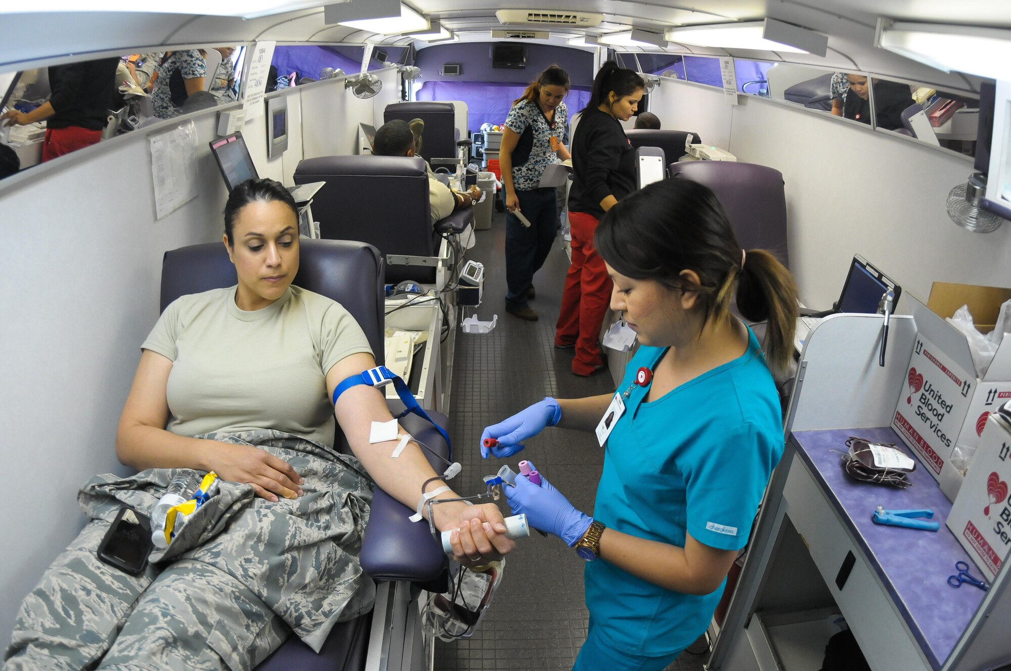 Senior Airman Taqla Eidson, 944th Force Support Squadron food service specialist, donates blood May 7 during the 944th Fighter Wing Blood Drive. United Blood Services, a non-profit community blood center founded in Phoenix, Ariz. in 1943, provides blood and blood products to more than 500 hospitals across the United States. (U.S. Air Force photo by Tech. Sgt. Nestor Cruz)