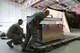 Tech Sgt. Diego Velasquez 927th Force Support Squadron journeyman and Tech Sgt. Jeffrey Horn 927 FSS journeyman, load mobile kitchen supplies onto a pallet during their annual tour at RAF Mildenhall, England on May 9, 2017. Nearly 30 citizen airmen from the 927 FSS fulfilled their requirement by providing services, communication, and military personnel functions. (U.S. Air Force Photo by Staff Sgt. Xavier Lockley)