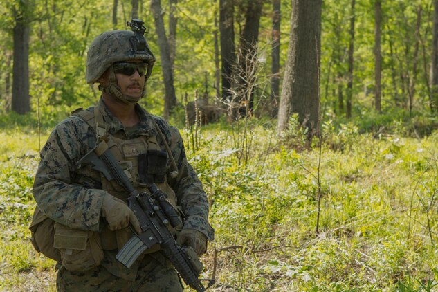 A Marine patrols a path during a company attack exercise at Fort A.P. Hill, Va., May 1, 2017. The Marines conducted a live-fire exercise that helped improve their leadership and teamwork abilities. The Marines are with G Company, 2nd Battalion, 2nd Marine Regiment. (U.S. Marine Corps photo by Pfc. Abrey D. Liggins)