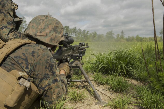 A Marine fires an M240B machine gun at a target during a company attack exercise at Fort A.P. Hill, Va., May 1, 2017. The Marines conducted a live-fire exercise that helped improve their leadership and teamwork abilities. The Marines are with G Company, 2nd Battalion, 2nd Marine Regiment. (U.S. Marine Corps photo by Pfc. Abrey D. Liggins)
