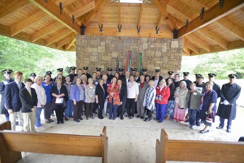 A group of descendants of Revolutionary War Private Samuel Howard, represent the family in a group photo with soldiers from the 3rd United States Infantry Regiment, traditionally known as "The Old Guard,"during Howard's reinterment May 12, 2017 at Resthaven Cemetery in Baxter, Ky. The U.S. Army Corps of Engineers Nashville District worked with local community and state officials to move Howard from Wix-Howard Cemetery when his grave was endangered by soil movement from a design deficiency of a flood control project completed in the 1990s. 

