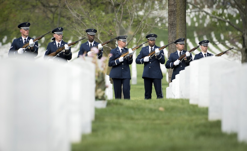 U.S. Air Force Honor Guard firing party shoots their M-14 rifles during a funeral service at Arlington National Cemetery in Arlington, Va., April 13, 2017. The firing party perform a firing of three volleys to give honors to those who have fallen. (U.S. Air Force photo by Senior Airman Philip Bryant)
