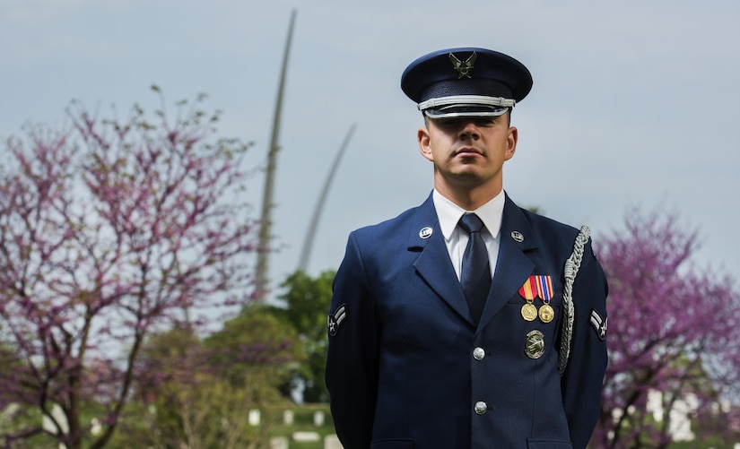 Airman 1st Class Jose Velazquez, U.S. Air Force Honor Guard firing party member, stands in an Air Force ceremonial uniform at Arlington National Cemetery in Arlington, Va., April 15, 2017. Velazquez came to America from Mexico at a young age and dreamed of joining the military. (U.S. Air Force photo by Senior Airman Philip Bryant)