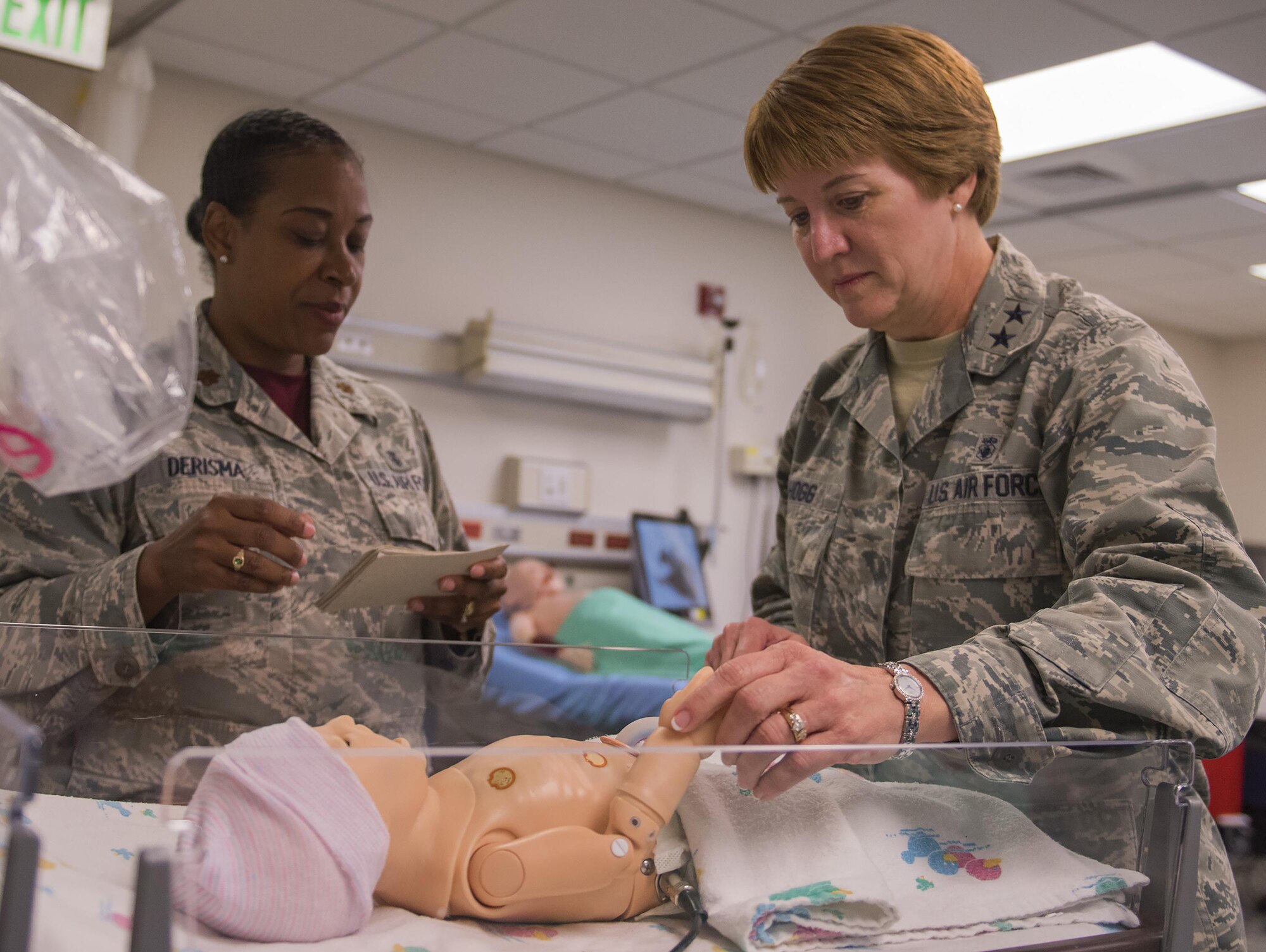 Maj. Guilene Derisma, 96th Medical Group, briefs Deputy Surgeon General and Chief of the Air Force Nurse Corps, Maj. Gen. Dorothy A. Hogg, during her visit to Eglin Air Force Base, Fla. May 12. Derisma highlighted the simulation laboratory’s training capabilities. Hogg’s visit took place during National Nurses and Technician Week. (U.S. Air Force photo/Ilka Cole)