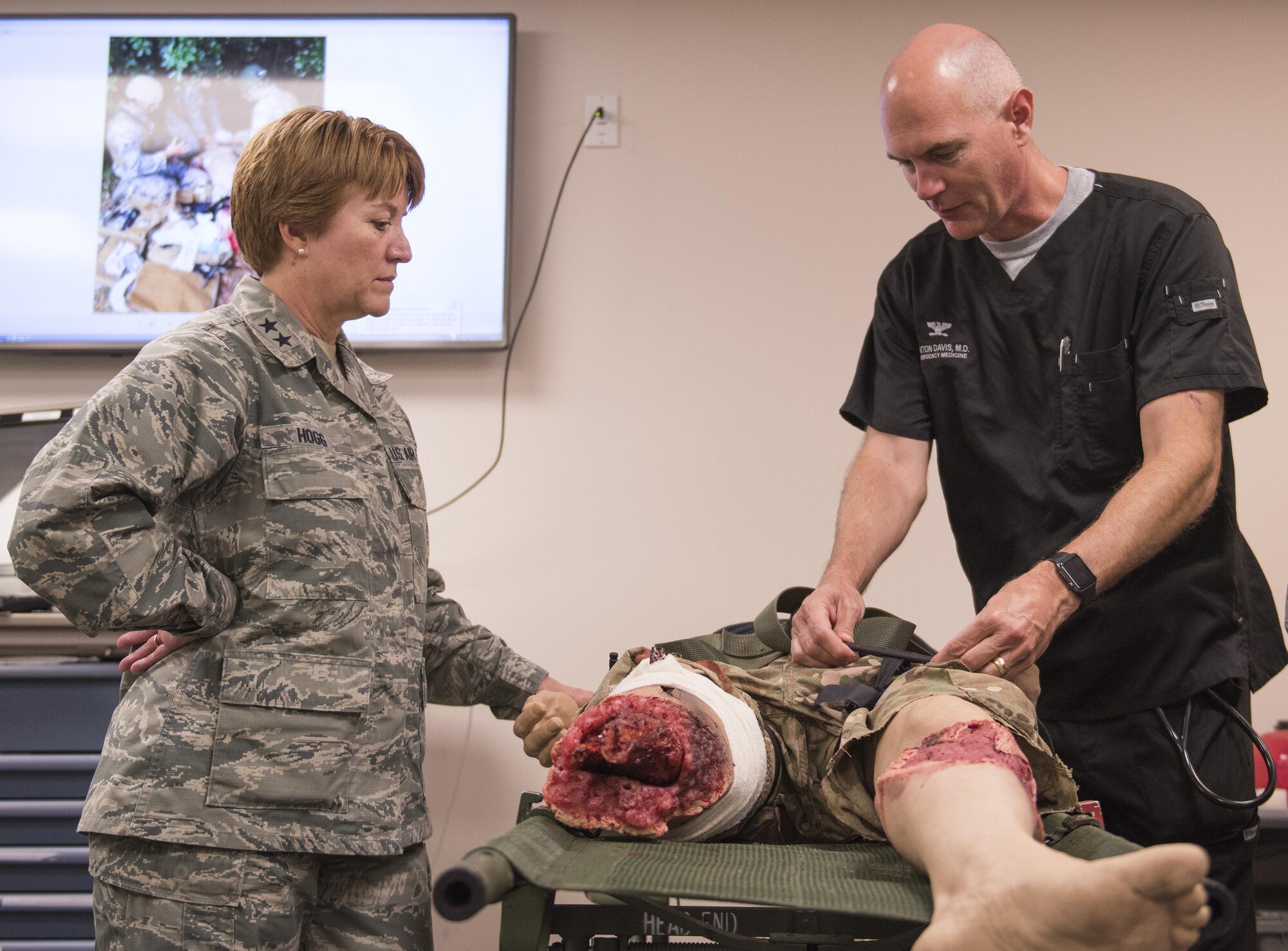 Col. Edwin Davis, 96th Medical Group, briefs Deputy Surgeon General and Chief of the Air Force Nurse Corps, Maj. Gen. Dorothy A. Hogg during her visit to Eglin Air Force Base, Fla. May 12.  Davis talked of the importance of tourniquet techniques and his real world deployment experience. Hogg’s visit took place during National Nurses and Technician Week. (U.S. Air Force photo/Ilka Cole)