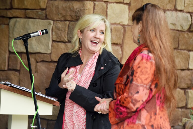 Stephanie Fister (Left) and Sharon Osborne, descendants of Revolutionary War Private Samuel Howard, represent the family during Howard's reinterment May 12, 2017 at Resthaven Cemetery in Baxter, Ky. The U.S. Army Corps of Engineers Nashville District worked with local community and state officials to move Howard from Wix-Howard Cemetery when his grave was endangered by soil movement from a design deficiency of a flood control project completed in the 1990s. 