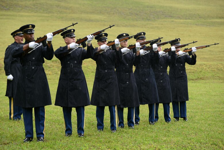 Soldiers from the 3rd United States Infantry Regiment, the Old Guard, shoot the first volley of a 21-gun salute during a reinterment ceremony May 12, 2017 for Private Samuel Howard, Revolutionary War soldier, at Resthaven Cemetery in Baxter, Ky.