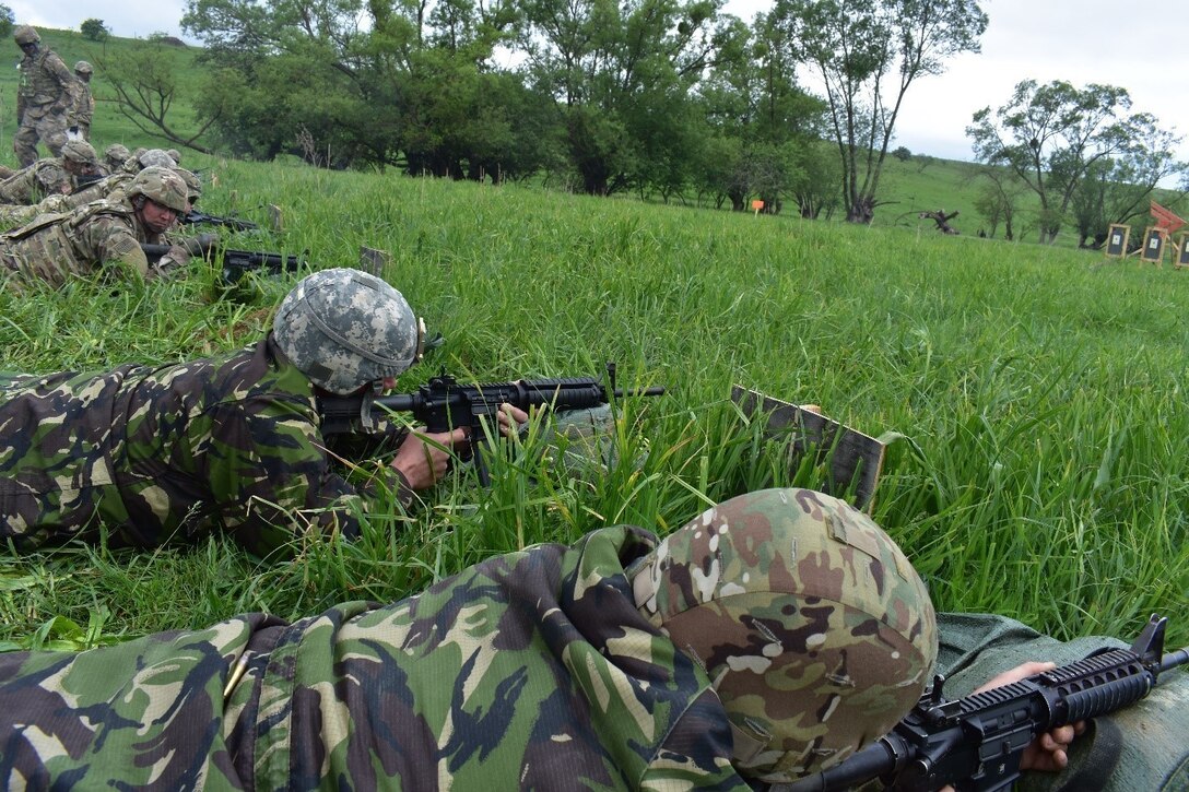 Soldiers from the Romanian 136th Engineer Battalion, 10th Engineer Brigade, and 926th Engineer Battalion, 926th Engineer Brigade, United States Army Reserves, zero their weapons at an M4 qualification range at Joint National Training Center, Cincu, Romania, as part of Resolute Castle 17, May 10, 2017. Resolute Castle 17 is an exercise strengthening the NATO alliance and enhancing its capacity for joint training and response to threats within the region.