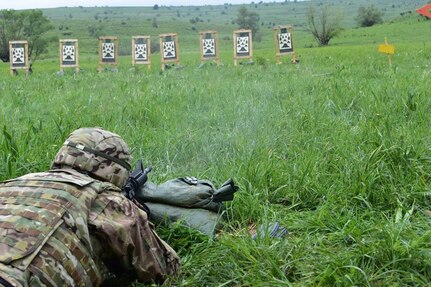 A Soldier from the 926th Engineer Battalion, 926th Engineer Brigade, United States Army Reserves, qualifies in the prone supported position at an M4 qualification range at Joint National Training Center, Cincu, Romania, as part of Resolute Castle 17, May 10, 2017. Resolute Castle 17 is an exercise strengthening the NATO alliance and enhancing its capacity for joint training and response to threats within the region.