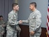 Col. Eric Shafa, 42nd Air Base Wing commander, presents Staff Sgt. Robert Dantzler, 42nd Air Base Wing Public Affairs broadcast journalist, a commander’s coin, May 15, 2017, Maxwell Air Force Base, Ala. Dantzler was awarded first place in the 2016 Defense Media Award’s Video Feature Story category for his video “Our Names on Her Arm.” The video tells the story of the 455th Expeditionary Medical Group’s mission to save the life and leg of a six year old girl who had been shot. Dantzler made the video while deployed at Bagram Airfield, Afghanistan. (U.S. Air Force photo/ Senior Airman Alexa Culbert)