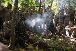 Philippine Special Forces demonstrate to U.S. Soldiers, 1st Battalion, 23rd Infantry Regiment, how to make a fire from bamboo shoots during a subject matter expert exchange in support of Balikatan 2017 at Fort Magsaysay in Santa Rosa, Nueva Ecija, May 13, 2017.  U.S. Soldiers trained with Philippine Special Forces to understand the Armed Forces of the Philippines' techniques for operating in a jungle environment. Balikatan is an annual U.S.-Philippine bilateral military exercise focused on a variety of missions, including humanitarian and disaster relief, counterterrorism, and other combined military operations. 