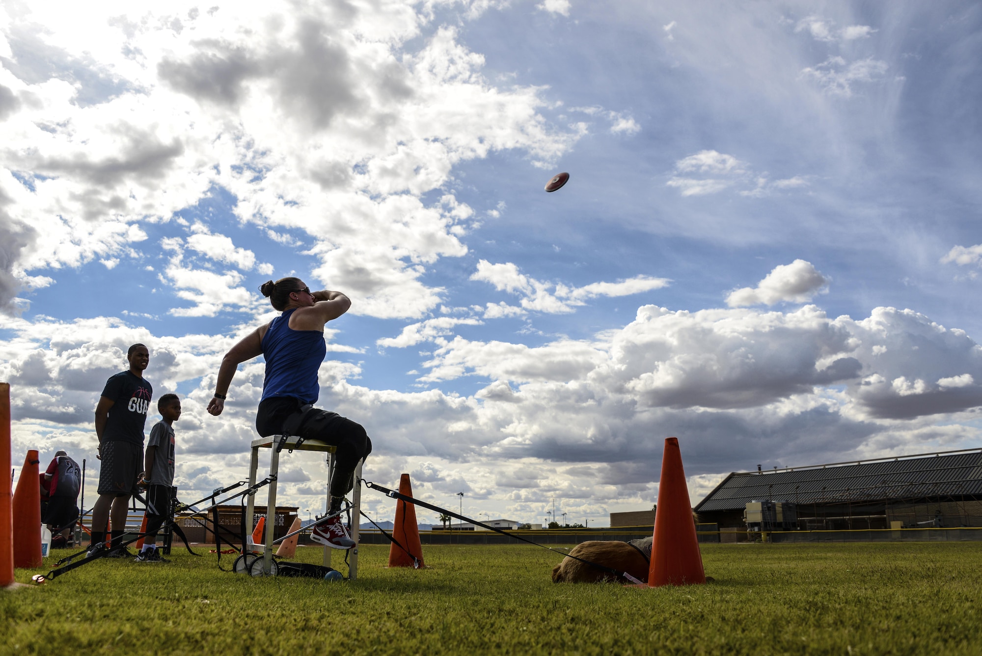 Christy Gardner, 2017 Paralympics competitor, practices throwing a discus May 10, 2017, at Luke Air Force Base, Ariz. Luke AFB and the 56th Force Support Squadron supported and hosted U.S. Paralympic Military Athletes for a track and field training camp prior to the Desert Challenge Games at Arizona State University in Tempe, Ariz. (U.S. Air Force photo by Airman 1st Class Caleb Worpel)