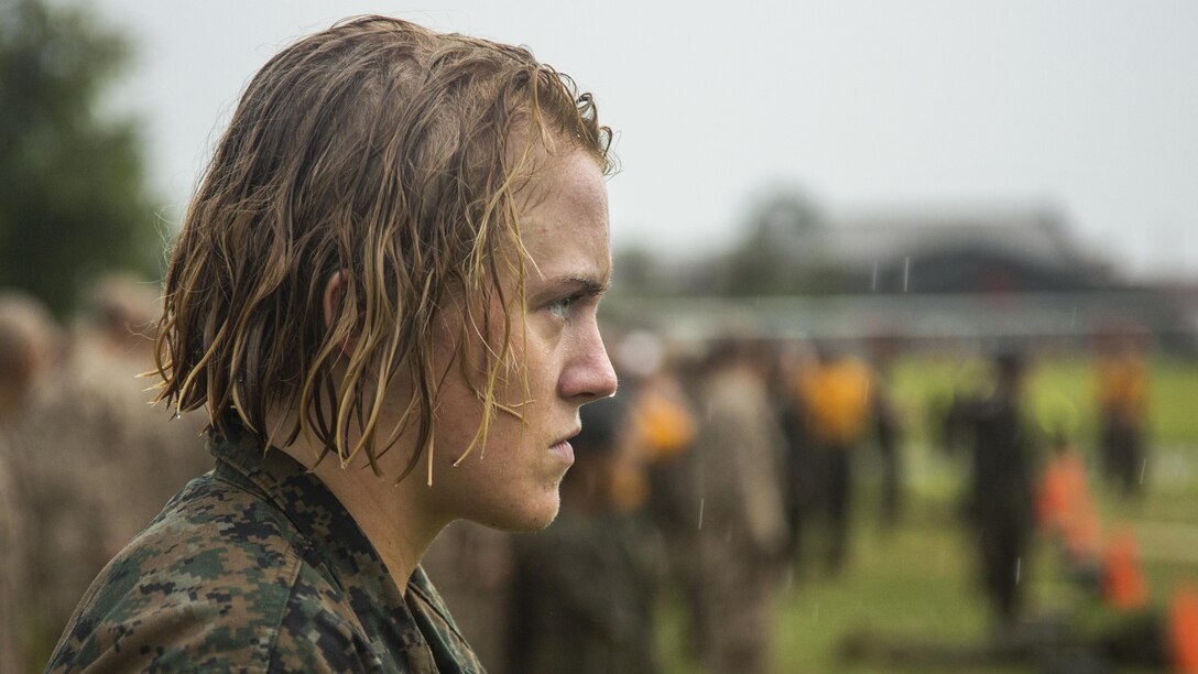 Marine Corps recruit Elizabeth Fraser waits in the rain to conduct the maneuver under fire portion of the combat fitness test at Marine Corps Recruit Depot Parris Island, S.C., May 13, 2017. Fraser is assigned to Platoon 4021, Oscar Company, 4th Battalion, Recruit Training Regiment. Marine Corps photo by Chief Warrant Officer 2 Pete Thibodeau