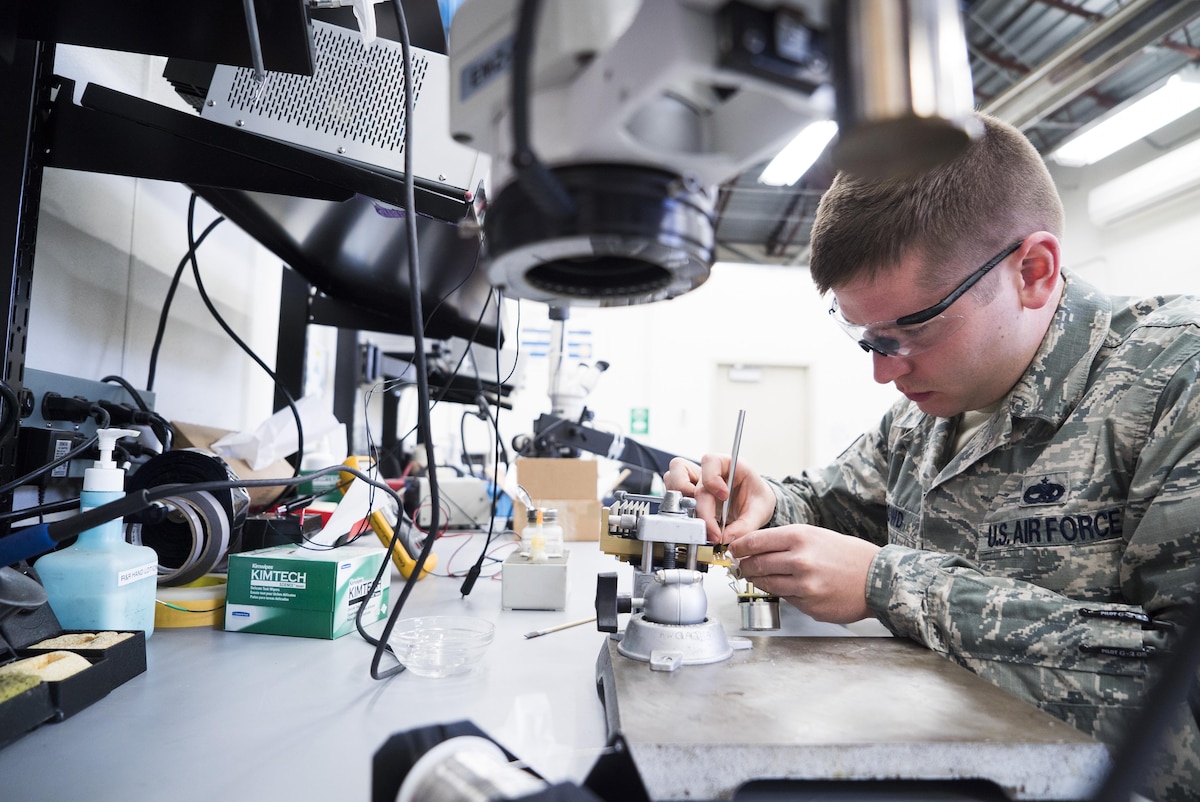 Staff Sgt. Zachary Dowd, Air Force Repair Enhancement Program circuit card technician, replaces a resistor on a power supply at Mountain Home Air Force Base, Idaho, May 8, 2017. The four-person AFREP team saved the Air Force a combined $1.3 million in 2016, and is on-track to save $2.5 million in 2017, between cost savings and cost avoidance. (U.S. Air Force photo/Staff Sgt. Samuel Morse)