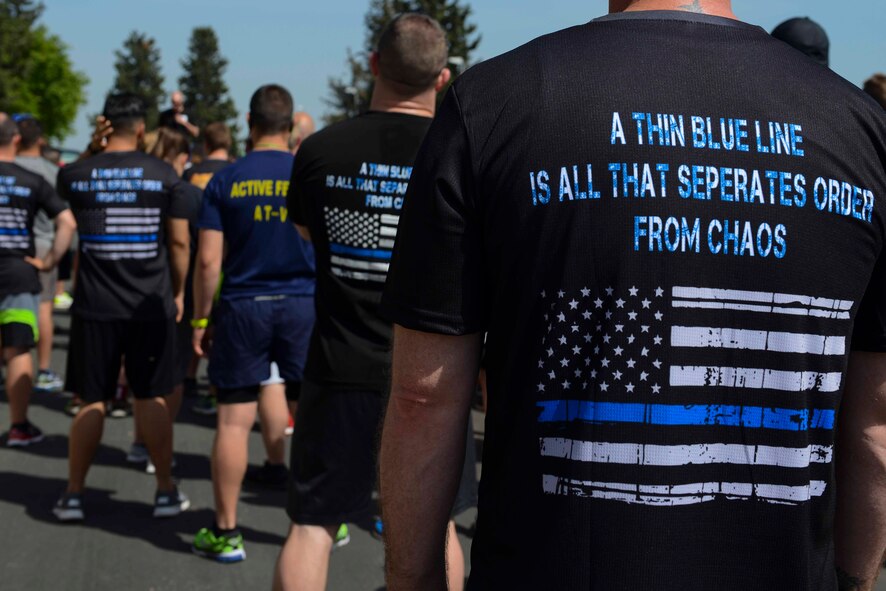 Members assigned to the 39th Air Base Wing, attend the opening ceremony for Police Week 2017, May 13, 2017, at Incirlik Air Base, Turkey. National Police Week began in 1962 after President John F. Kennedy signed a proclamation designating May 15 as Peace Officers Memorial Day and the week in which that date falls as Police Week. (U.S. Air Force photo by Airman 1st Class Devin M. Rumbaugh)