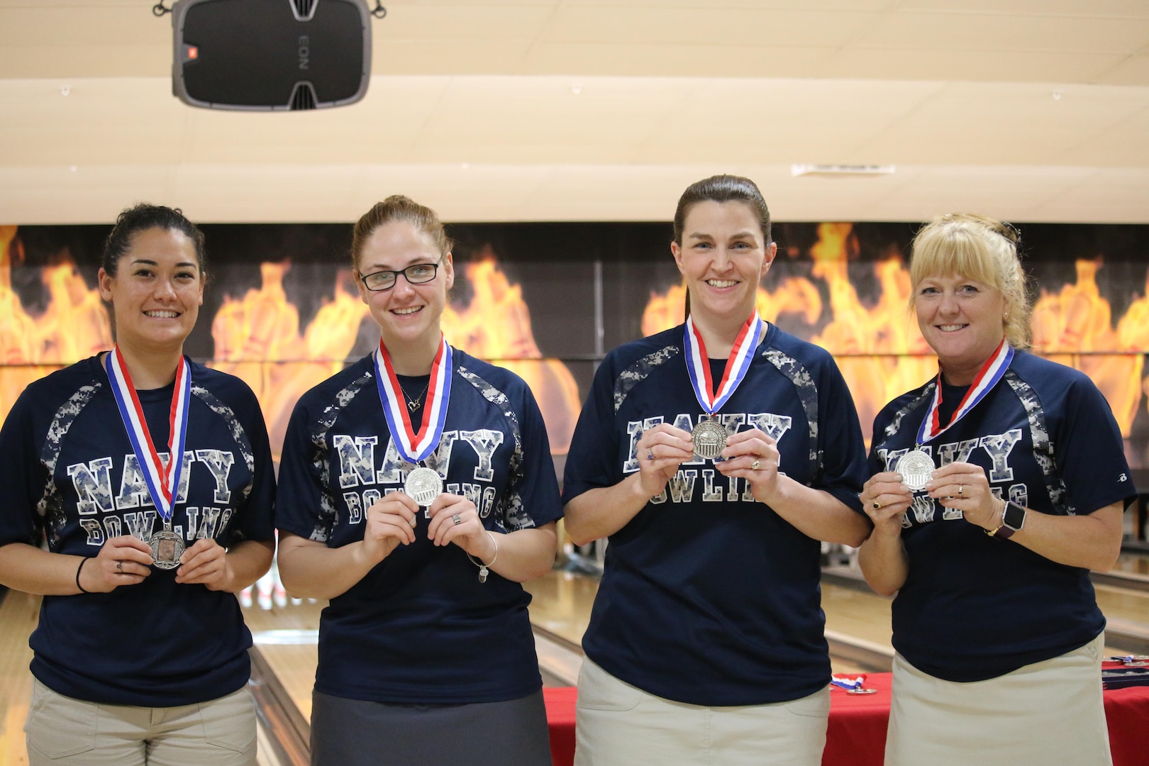 Navy Women take Team Silver at the Armed Forces Bowling Championship hosted at Marine Corps Base Camp Pendleton, California from 5-8 May at the Leatherneck Lanes. Pictured is: Petty Officer 1st Class Melanie Griffith, USS Essex; Petty Officer 1st Class Ashley Scott, Navy Reserve COM; Senior Chief Petty Officer Debbee Simon, San Diego, CA; Cmdr. 	Tamara Tuttle, Groton, Conn.