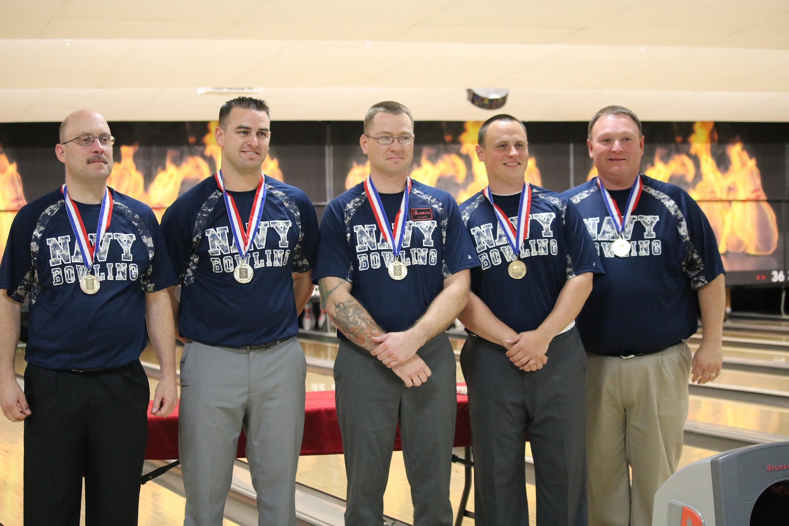Navy Men win the 2017 Armed Forces Men's Team Title at the Armed Forces Bowling Championship hosted at Marine Corps Base Camp Pendleton, California from 5-8 May at the Leatherneck Lanes. Pictured: Petty Officer 1st Class Guy Cruise, Norfolk, Vir.; Coast Guard LTJG Scott McIntire, USCG Honor Guard, DC; Petty Officer 2nd Class Zachary Torrosian, Lemoore, Calif.; Petty Officer 1st Class Michael Zylius, USS Mason