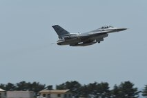 A U.S. Air Force F-16 Fighting Falcon flies above Kunsan Air Base, Republic of Korea, May 15, 2017. Six aircraft from the 35th Fighter Squadron departed Kunsan to participate in Buddy Wing 17-4. The exercise enhances interoperability between U.S. and ROK forces for combined operations. (U.S. Air Force photo by Senior Airman Michael Hunsaker/Released)