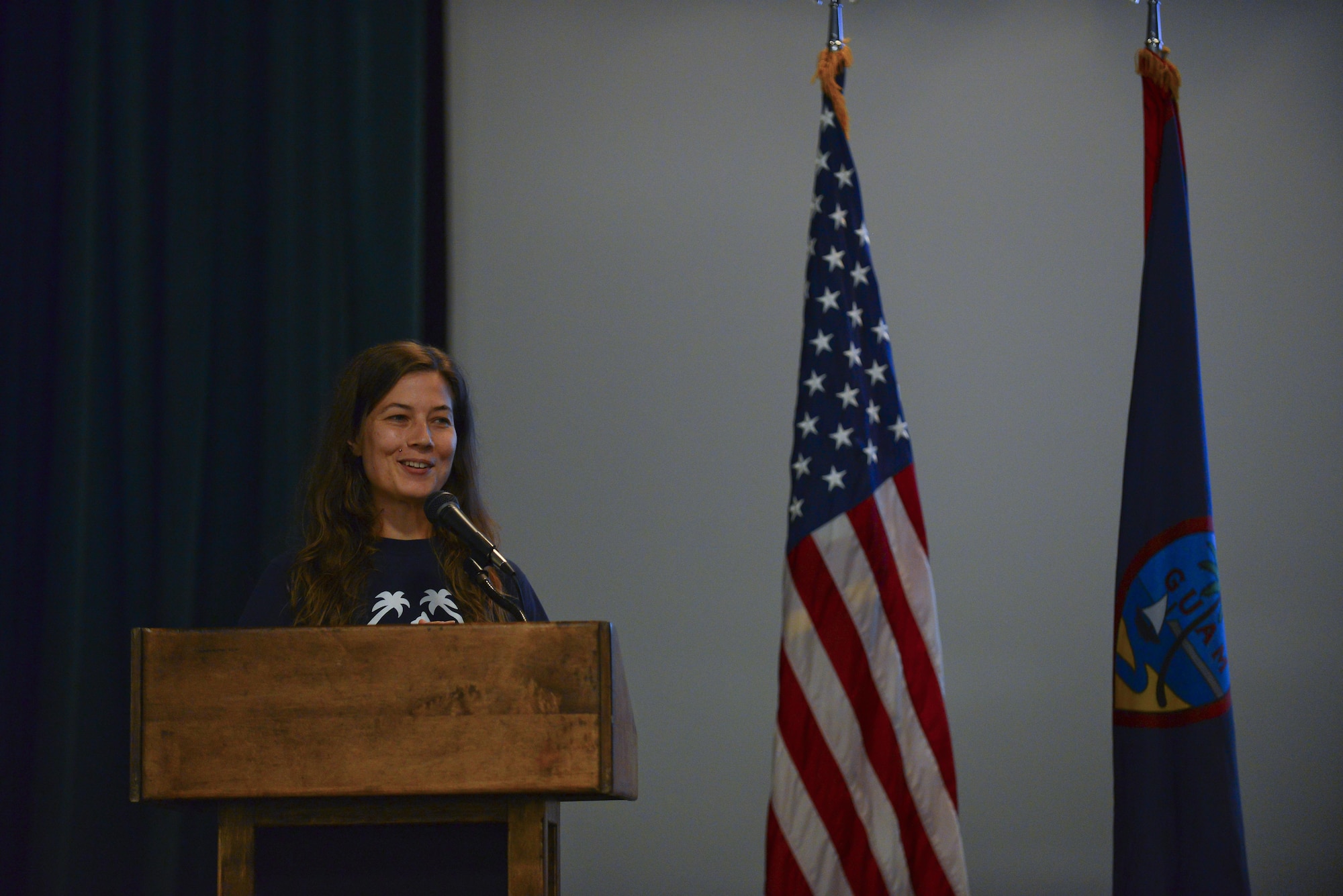 Alison Hadley, executive director at Guam Animals In Need (GAIN), speaks at the Service Unites volunteer appreciation ceremony, April 26, 2017, at Andersen Air Force Base, Guam. Volunteer organizations across Guam such as GAIN are always looking for volunteers. (U.S. Air Force photo by Airman 1st Class Christopher Quail) 