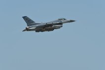 A U.S. Air Force F-16 Fighting Falcon flies above Kunsan Air Base, Republic of Korea, May 15, 2017. Six aircraft from the 35th Fighter Squadron departed Kunsan to participate in Buddy Wing 17-4. The exercise enhances interoperability between U.S. and ROK forces for combined operations. (U.S. Air Force photo by Senior Airman Michael Hunsaker/Released)