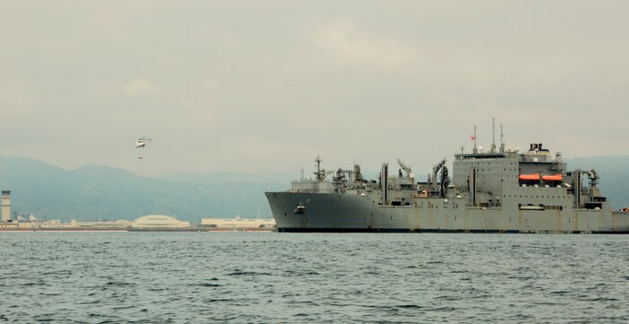 An SA-330 Puma helicopter from the Lewis and Clark-class USNS Richard E. Byrd (T-AKE 4) delivers supplies to Marine Corps Air Station (MCAS) Iwakuni, Japan, during a vertical replenishment at MCAS Iwakuni, May 13, 2017. Vertical replenishments utilize helicopters to transport equipment to and from ships. (U.S. Marine Corps photo by Pfc. Stephen Campbell)