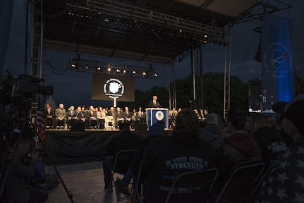 Police officers and family members attend the 29th Annual Candlelight Vigil honoring fallen police officers from around the country on the National Mall in Washington, D.C., May 13, 2017. Approximately 300 police officers' names were read, engraved into the National Police Memorial. Among those names was Staff Sgt. James D. McNaughton, a U.S. Army Reserve military police who was the first New York City police officer killed in action while deployed to Iraq, Aug. 2, 2005.