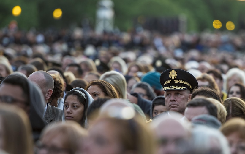 Brig. Gen. John Hussey, commander of the Great Lakes Training Division, Fort Sheridan, Illinois, attends the 29th Annual Candlelight Vigil honoring fallen police officers from around the country on the National Mall in Washington, D.C., May 13, 2017. Approximately 300 police officers' names were read, engraved into the National Police Memorial. Among those names was Staff Sgt. James D. McNaughton, a U.S. Army Reserve military police who was the first New York City police officer killed in action while deployed to Iraq, Aug. 2, 2005. (U.S. Army Reserve photo by Sgt. Audrey Hayes)