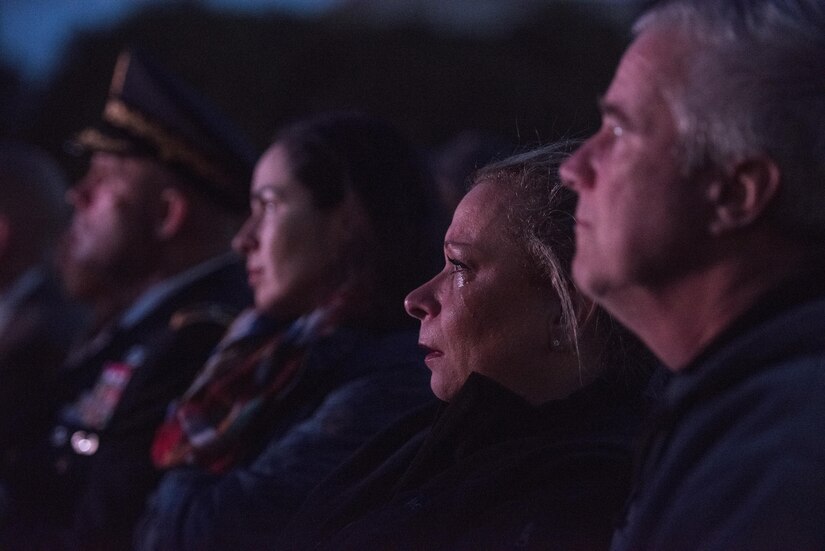 William and Michele McNaughton, from Centereach, New York, remember their son, Staff Sgt. James D. McNaughton, during the 29th Annual Candlelight Vigil, who is honored among other fallen police officers from around the country on the National Mall in Washington, D.C., May 13, 2017. McNaughton was a U.S. Army Reserve military police who was the first New York City police officer killed in action while deployed to Iraq, Aug. 2, 2005. Approximately 300 police officers' names were read, engraved into the National Police Memorial. (U.S. Army Reserve photo by Sgt. Audrey Hayes)