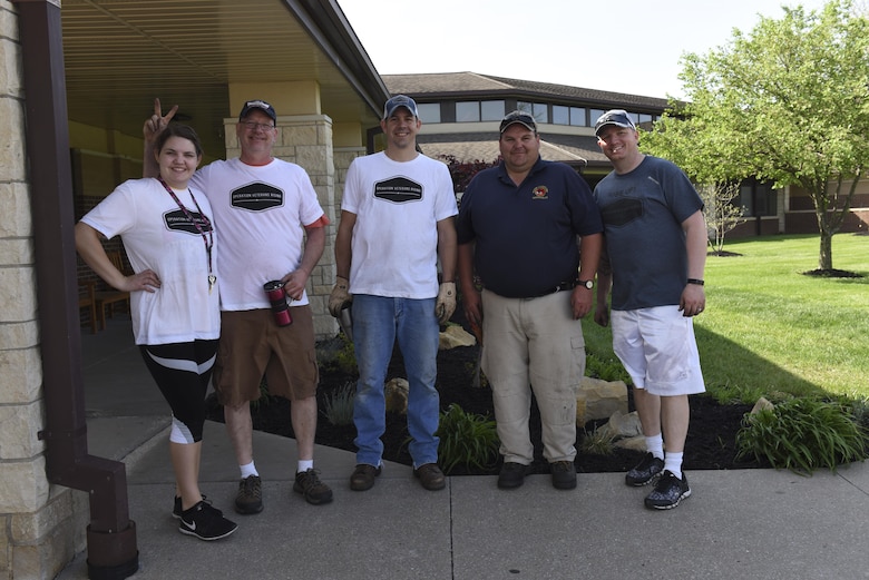 Operations Veterans Rising volunteers beautify the exterior of the Warrensburg Veterans Home, Mo., April 15, 2017. The Operation Veterans Rising is a non-profit organization created to help veterans and their families rise up from their daily struggles through a variety of financial aid programs.  (U.S. Air Force photo/ Senior Airman Danielle Quilla) 