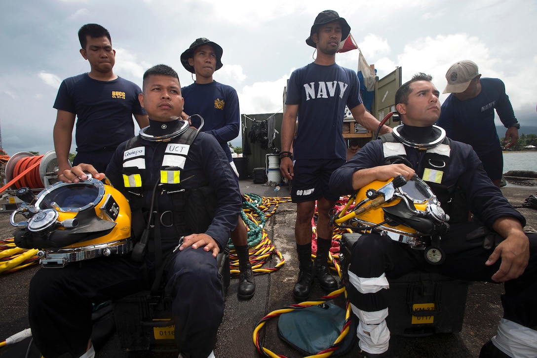 Philippine sailors prepare for dive training as part of exercise Balikatan 2017 at Ipil Port in Ormoc City, Philippines, May 12, 2017. The training prepared Philippine and U.S. service members to clear debris in ports and open up supply lines. Navy photo by Petty Officer 3rd Class Alfred A. Coffield