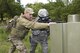 U.S. Air Force Tech. Sgt. Michael Perez, a 459th Security Forces Squadron instructor, works on firing techniques with Staff Sgt. Jonuel Otero, 459th SFS, during “Shoot, Move, Communicate” Training on May 7, 2017. All SFS members must qualify with the M4 Rifle and M9 pistol annually in conjunction with quarterly SMC Training in order to maintain currency and keep their skills sharp.