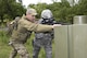 U.S. Air Force Tech. Sgt. Michael Perez, a 459th Security Forces Squadron instructor, works on firing techniques with Staff Sgt. Jonuel Otero, 459th SFS, during “Shoot, Move, Communicate” Training on May 7, 2017. All SFS members must qualify with the M4 Rifle and M9 pistol annually in conjunction with quarterly SMC Training in order to maintain currency and keep their skills sharp.