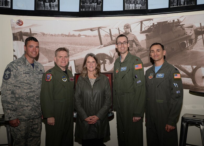 From left to right, U.S. Air Force Chief Master Sgt. Ronald Garbarini, 100th Aircraft Maintenance Squadron superintendent (formerly 95th Reconnaissance Squadron quality assurance superintendent); U.S. Air Force Col. Thomas Torkelson, 100th Air Refueling Wing commander; Jonna Doolittle Hoppes; Maj. Cary McCreary, 95th RS historian and assistant director of operations, and Lt. Col. Matt Cottrill, 95th RS director of operations, pose for a photo May 12, 2017, at the 95th RS Heritage Hub on RAF Mildenhall, England. Doolittle Hoppes is the granddaughter of Gen. James Harold “Jimmy” Doolittle, American aviation pioneer and retired lieutenant general in the U.S. Army Air Corps. On April 18, 1942, then-Lt. Col. Doolittle led the daylight air raid on Tokyo after the Japanese attacked Pearl Harbor. His crew on that mission became known as the “Doolittle Raiders.” During World War II, six of the 16 Doolittle Raiders’ crew were from the 95th Bomb Squadron. The 95th BS was redesignated the 95th RS in 1982. (U.S. Air Force photo by Karen Abeyasekere)