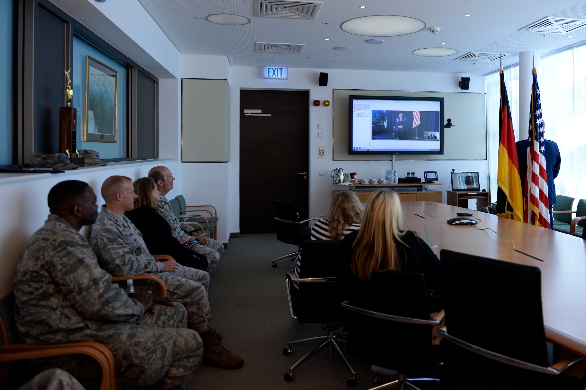 Col. Joseph McFall, 52nd Fighter Wing commander, promotes his sister, Theresa Goodman, to the rank of colonel via video teleconferencing technology, May 15, 2017 at Spangdahlem Air Base, Germany. Goodman is a medical inspector at the Air Force Inspection Agency headquarters at Kirtland Air Force Base, New Mexico, 5296 miles away from Spangdahlem. (U.S. Air Force photo by Tech. Sgt. Staci Miller)