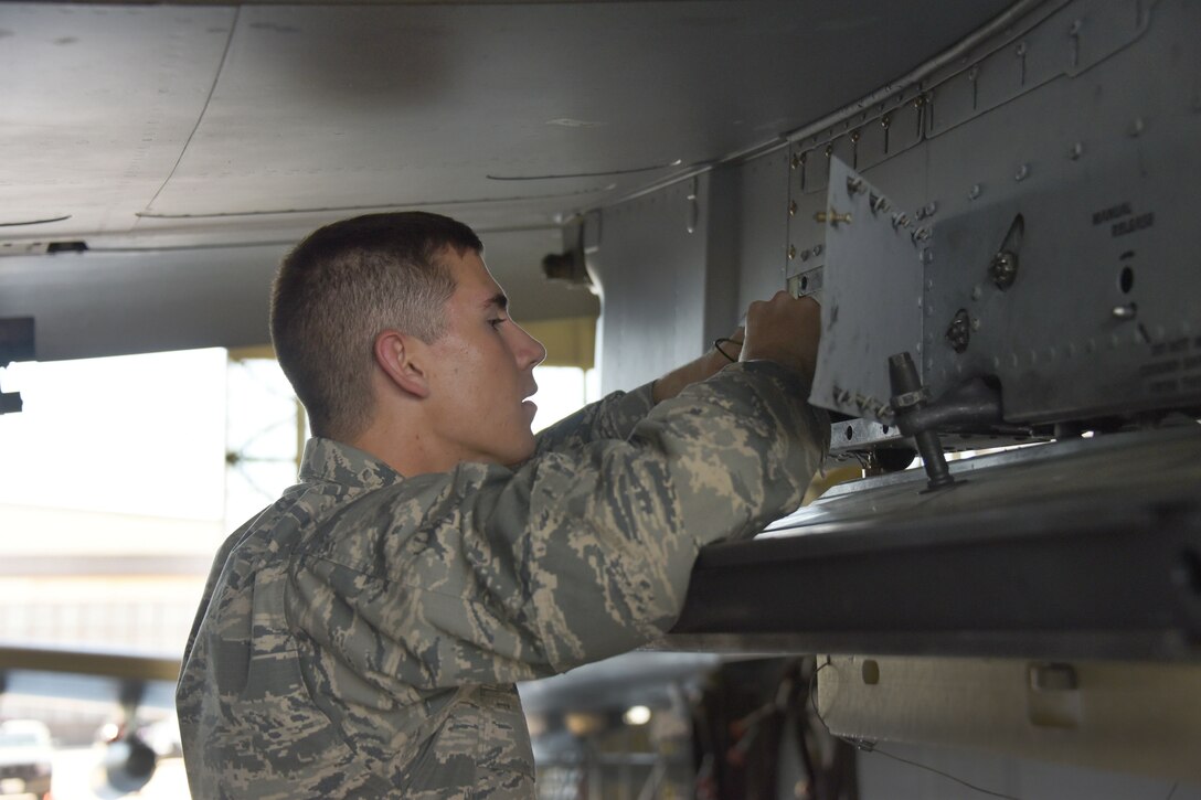 Airman Colton Curry, 363rd Training Squadron A-10 students, learns how to remove and install a dual rail adapter on station one of the A-10 aircraft at Sheppard Air Force Base, Texas, March 23, 2017. This training course lasts approximately 68 days. (U.S. Air Force photo by Liz H. Colunga/Released)  

