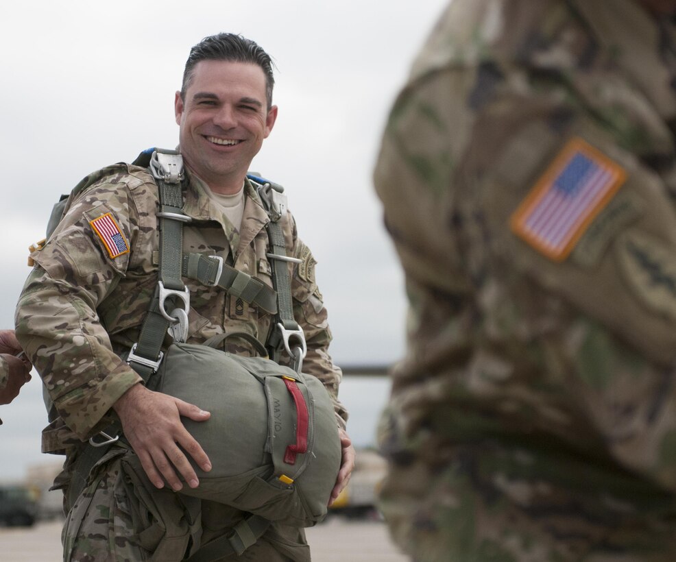 U.S. Army Master Sgt. Michael Contic, with West Virginia Army National Guard's 2nd Battalion, 19th Special Forces Group, parachuted from a C-130 aircraft Saturday, March 13, 2017, during the Wings over Pittsburgh Open House. The event, hosted by the 911th Air Wing and 758th Aviation Squadron, was collaboration with the Air Force Reserve, Army National Guard, Army Reserve and the Navy Reserve. (U.S. Army photo by Staff Sgt. Shaiyla Hakeem/Released).